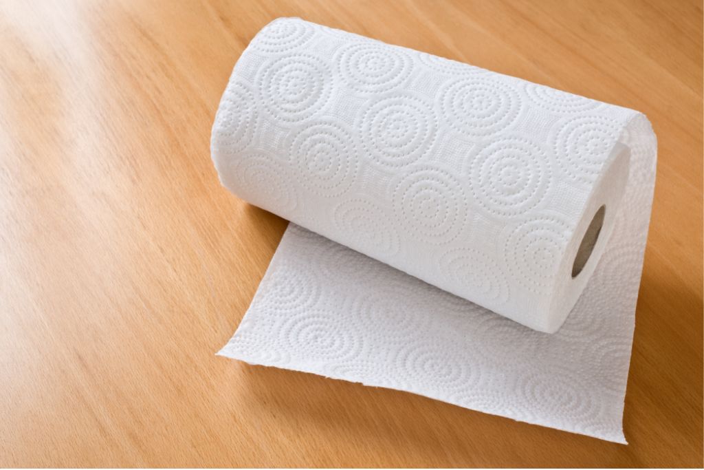 rolled Paper Towel on wooden floor